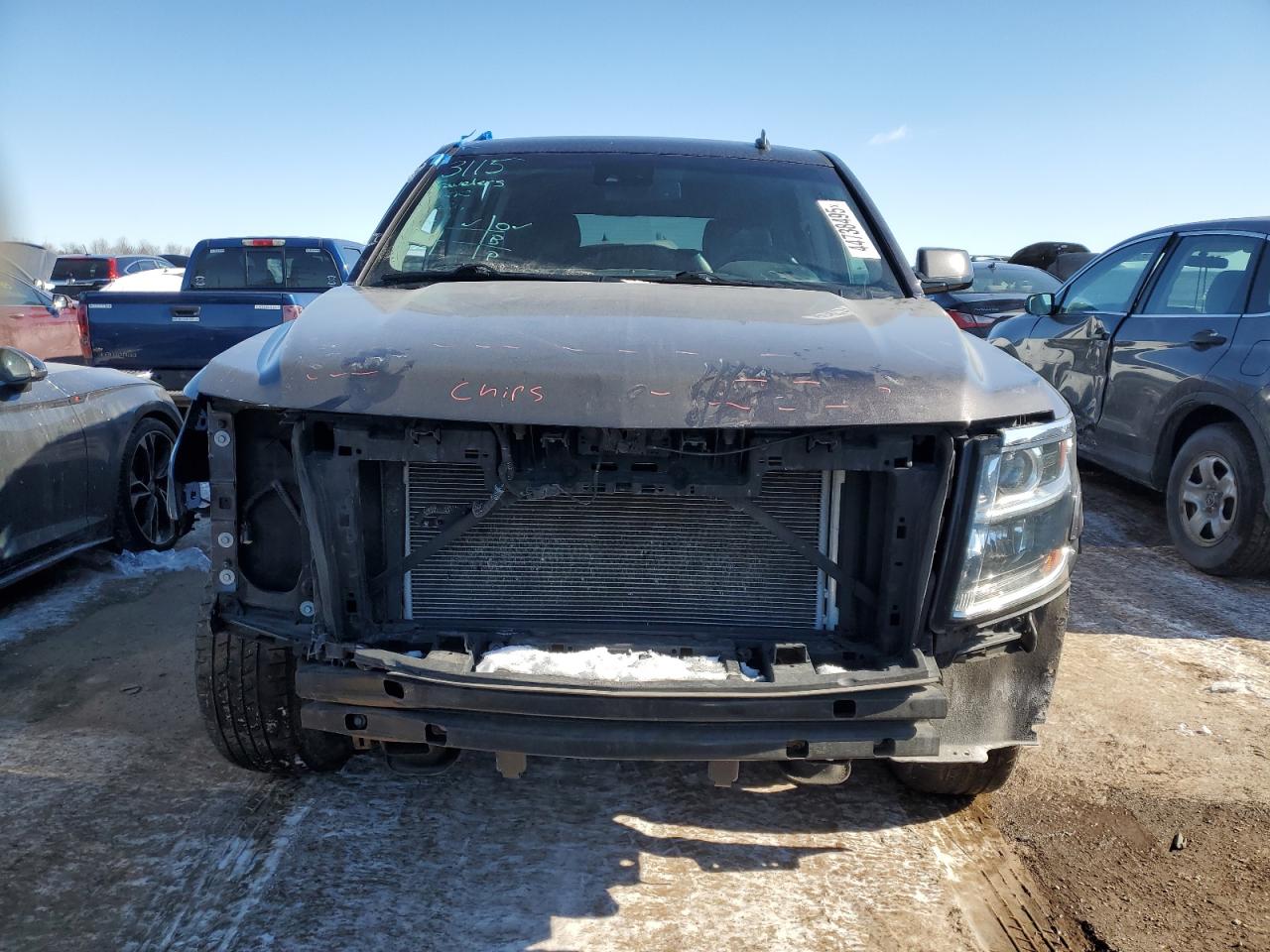 2015 Chevrolet Tahoe VIN 1GNSKBKCXFR225169 Copart auction photo, front end / side damage thumbnail 5