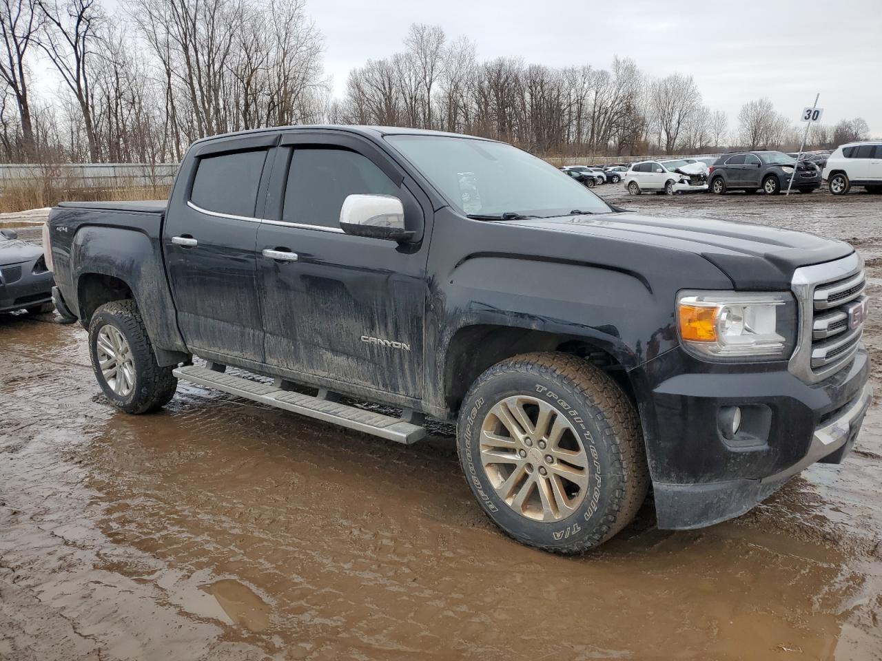 2015 GMC Canyon VIN 1GTG6CE36F1130143 Copart auction photo, side / rear end damage thumbnail 4