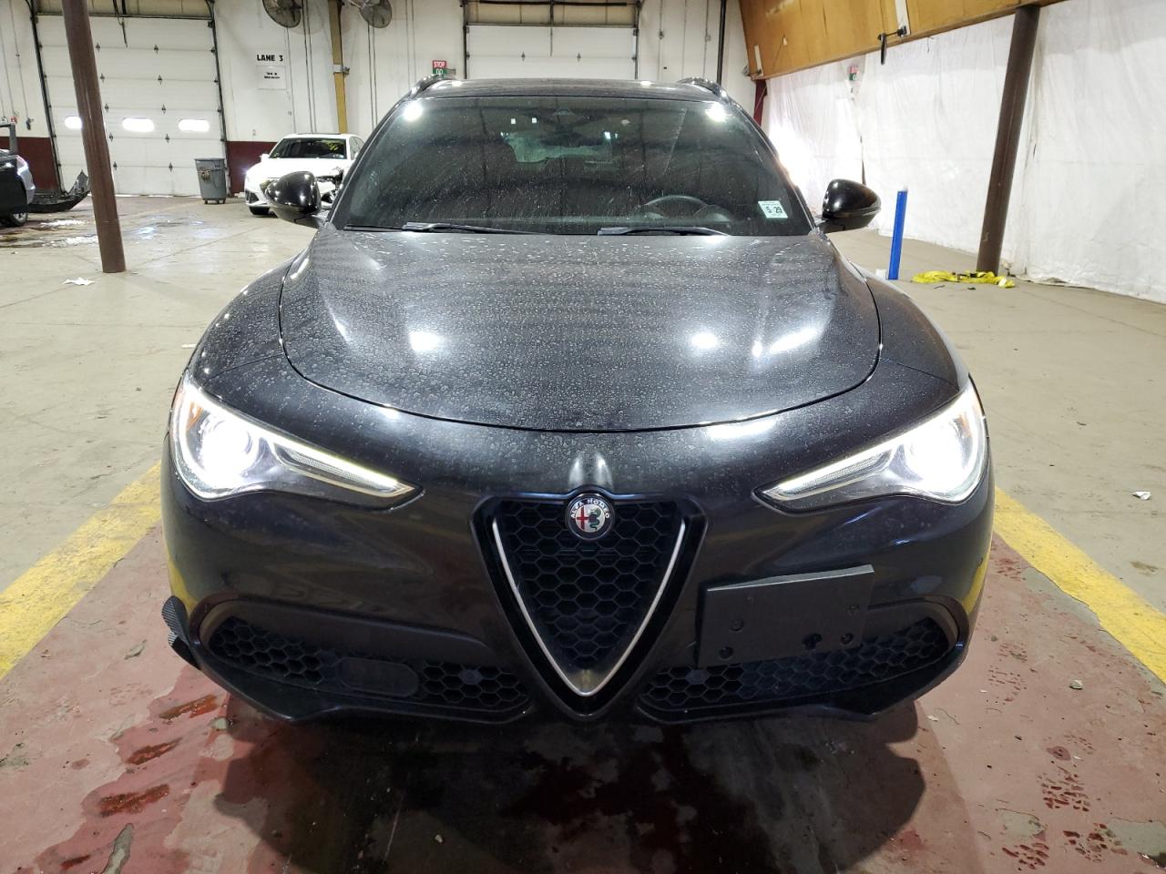 2019 Alfa Romeo Stelvio VIN ZASPAKBN6K7C29591 Copart auction photo, rear end / minor dent/scratches damage thumbnail 5