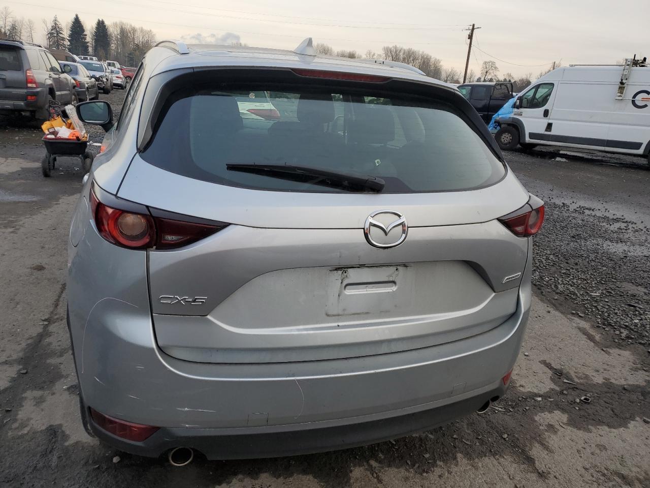 2018 Mazda CX-5 VIN JM3KFABM7J0343832 Copart auction photo, front end / side damage thumbnail 6