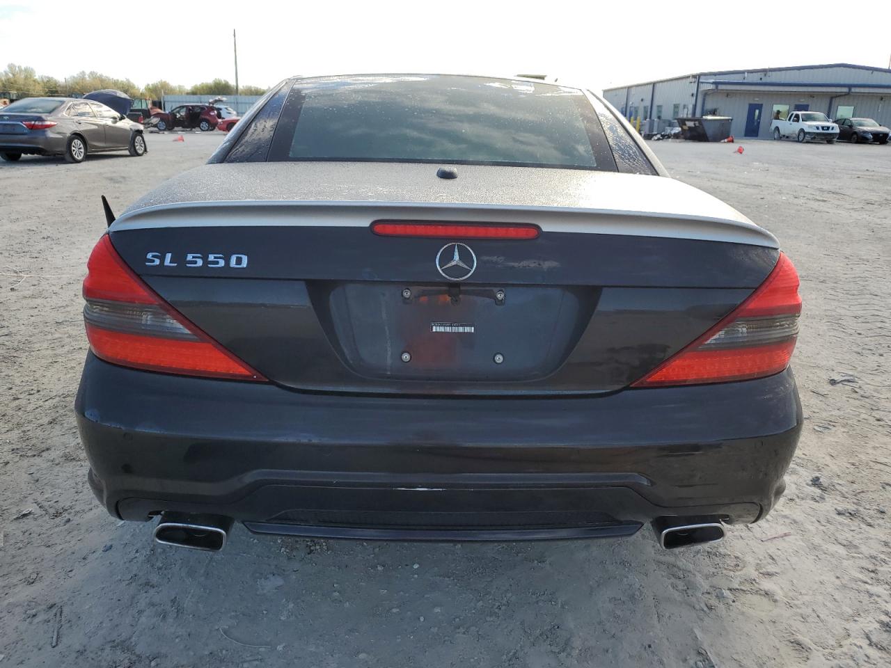 2009 Mercedes-Benz SL-klasse VIN WDBSK71F09F144591 Copart auction photo, front end / side damage thumbnail 6