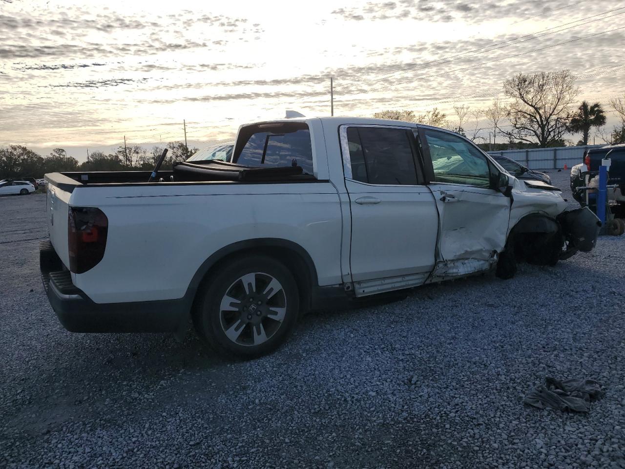 2019 Honda Ridgeline VIN 5FPYK2F63KB002874 Copart auction photo, front end / side damage thumbnail 3