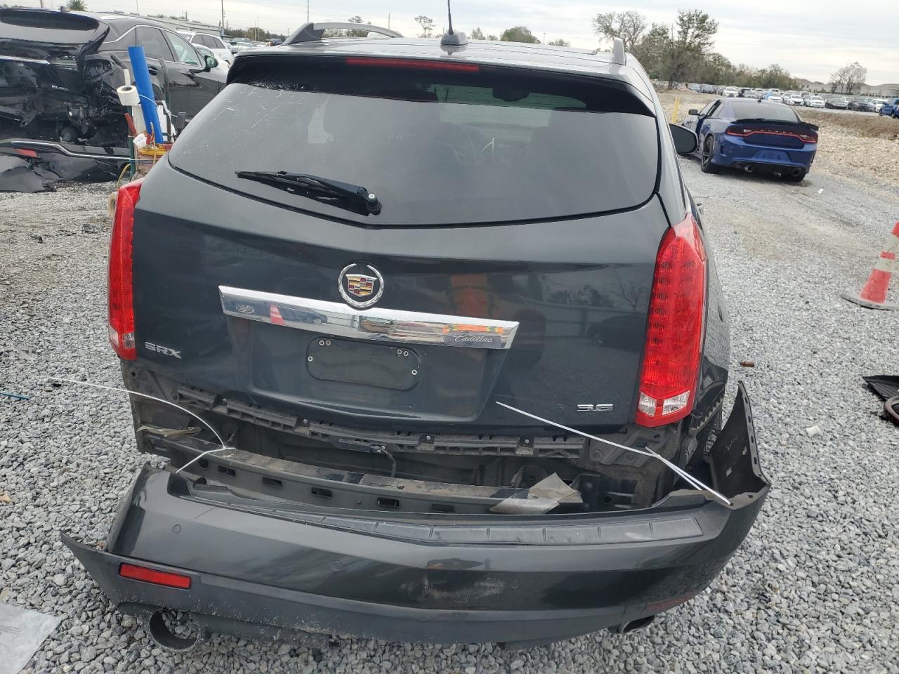 2015 Cadillac SRX VIN 3GYFNBE33FS545843 Copart auction photo, all over damage thumbnail 6