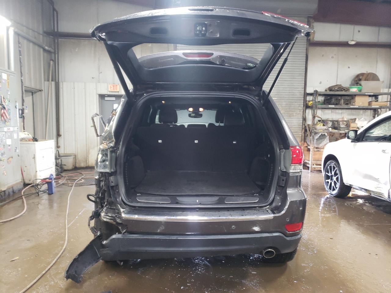 2018 Jeep Grand Cherokee VIN 1C4RJFBG8JC212291 Copart auction photo, rear end / side damage thumbnail 6