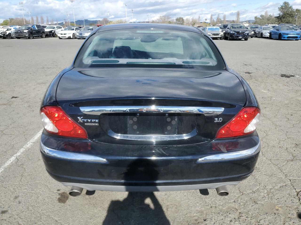 2004 Jaguar X-Type VIN SAJEA51C74WD56736 Copart auction photo, front end / side damage thumbnail 6