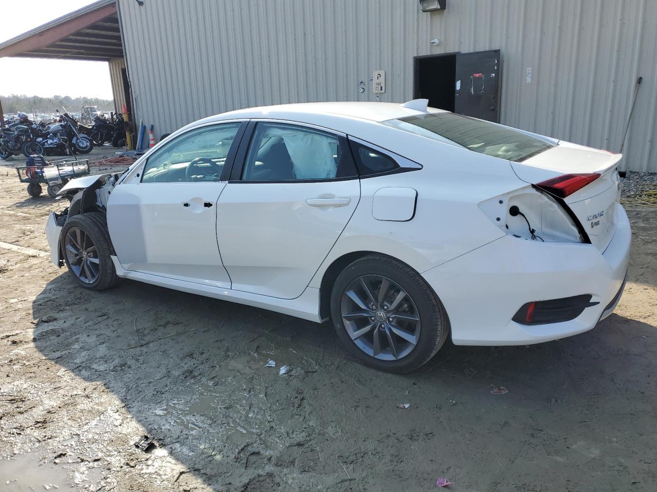 2020 Honda Civic VIN 19XFC1F34LE217359 Copart auction photo, side / front end damage thumbnail 2