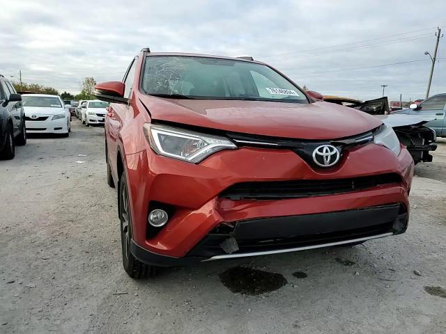 2016 Toyota RAV 4 VIN JTMRFREV0GJ103552 Copart auction photo, front end / minor dent/scratches damage thumbnail 12