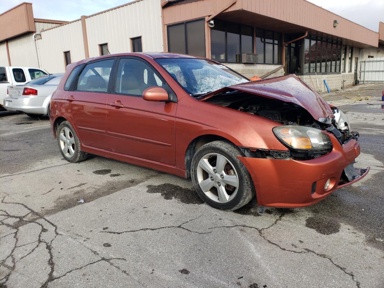 2009 KIA Spectra VIN KNAFE241395024865 Copart auction photo, front end / top/roof damage thumbnail 4