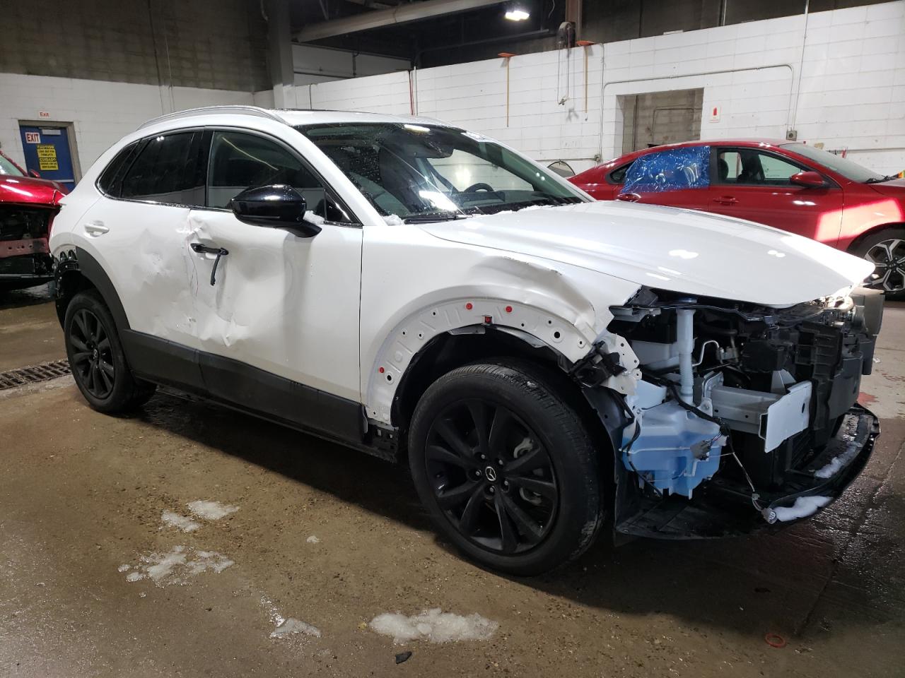 2023 Mazda CX-30 VIN 3MVDMBEY3PM587798 Copart auction photo, all over damage thumbnail 4