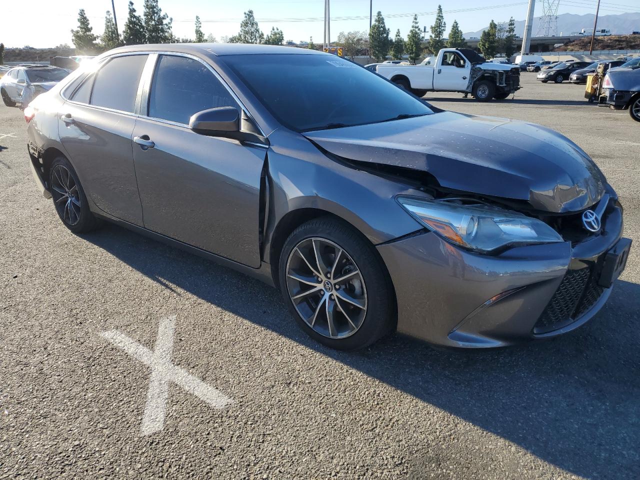 2015 Toyota Camry VIN 4T1BF1FK6FU104303 Copart auction photo, front end / rear end damage thumbnail 4