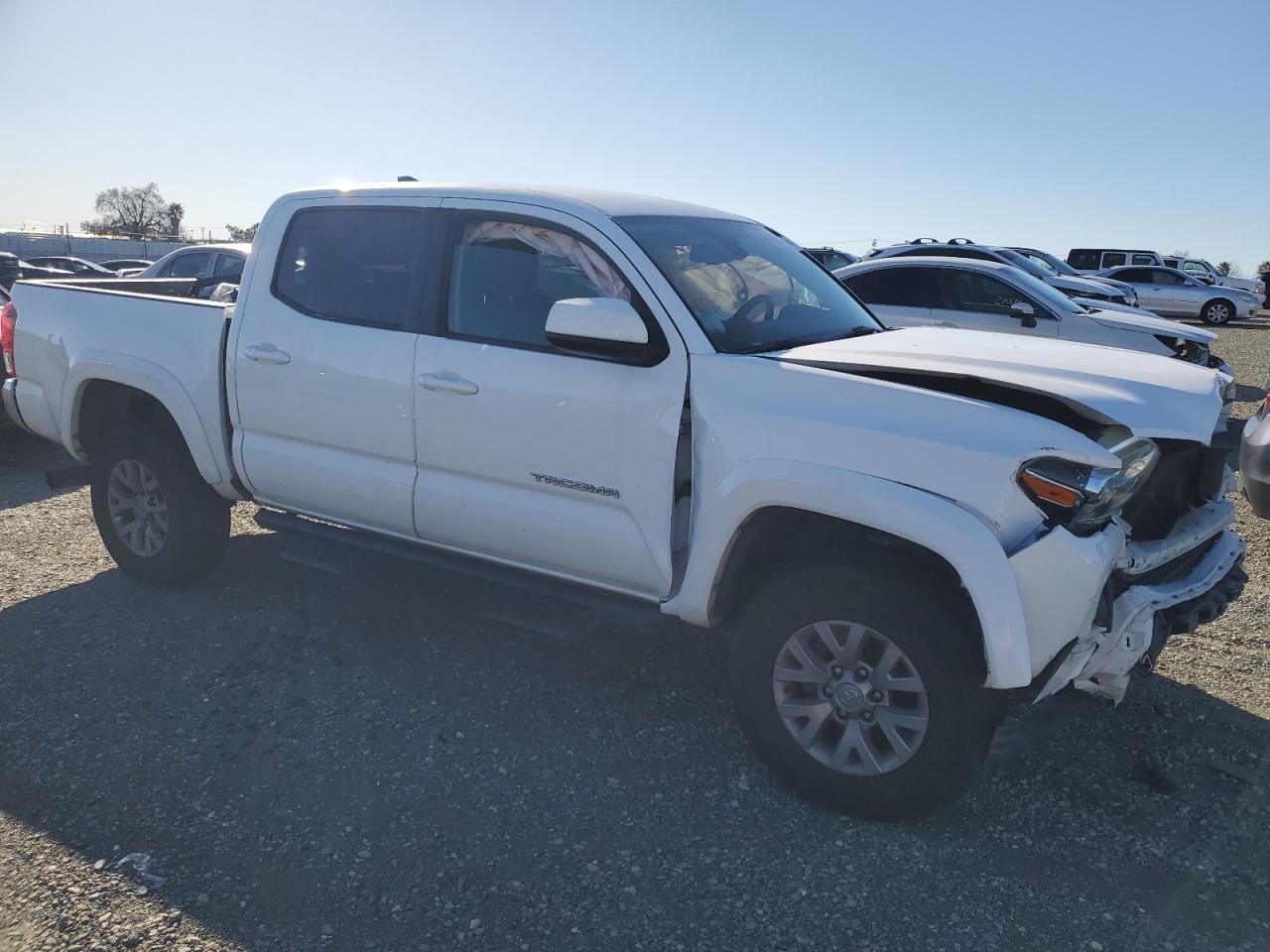 2019 Toyota Tacoma VIN 3TMAZ5CN2KM093134 Copart auction photo, front end / minor dent/scratches damage thumbnail 4