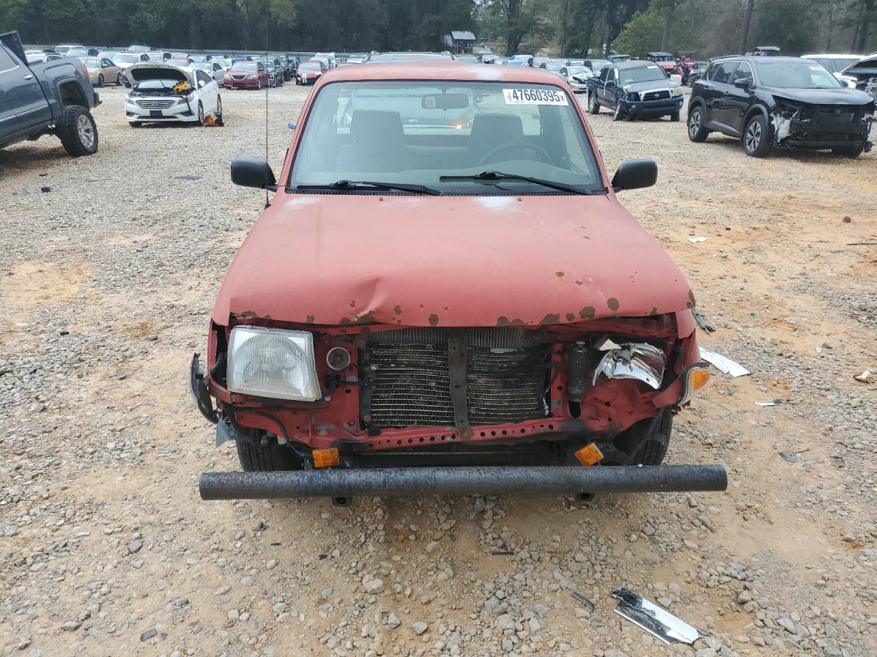 1999 Toyota Tacoma VIN 4TANL42N6XZ451352 Copart auction photo, front end damage thumbnail 5