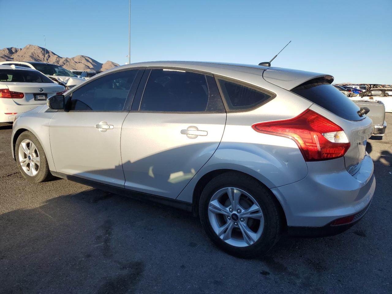 2014 Ford Focus VIN 1FADP3K23EL382730 Copart auction photo, minor dent/scratches damage thumbnail 2