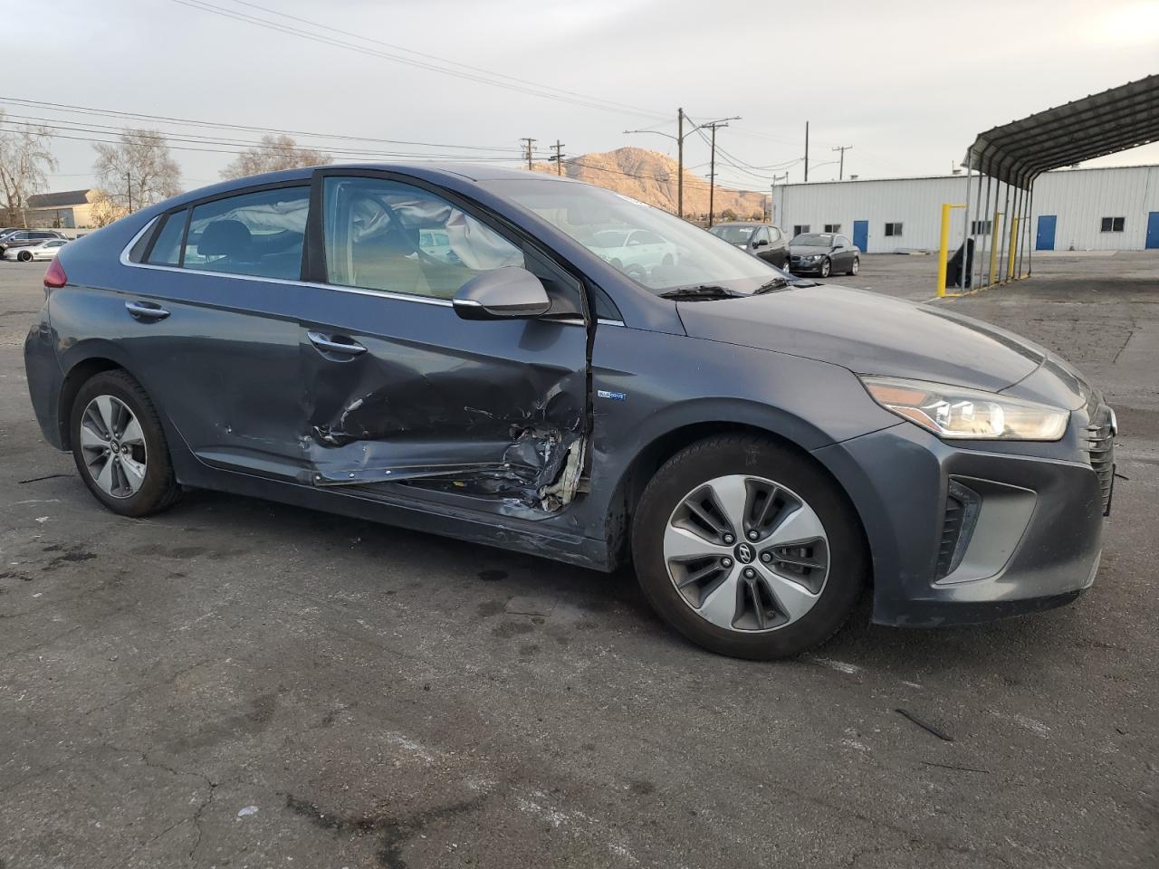 2018 Hyundai IONIQ VIN KMHC75LDXJU075248 Copart auction photo, side damage thumbnail 4