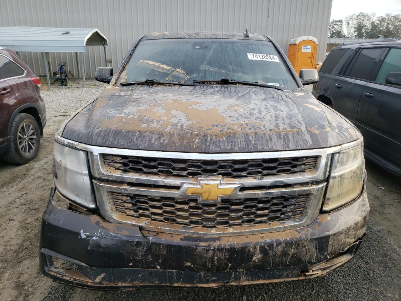 2015 Chevrolet Tahoe VIN 1GNSKBKC9FR636725 Copart auction photo, water/flood damage thumbnail 5