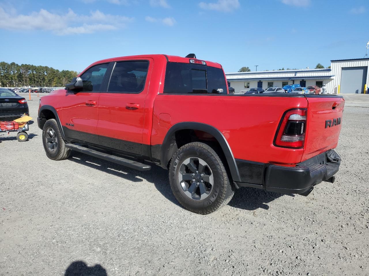 2020 RAM 1500 VIN 1C6RRELT4LN320355 Copart auction photo, rear end damage thumbnail 2