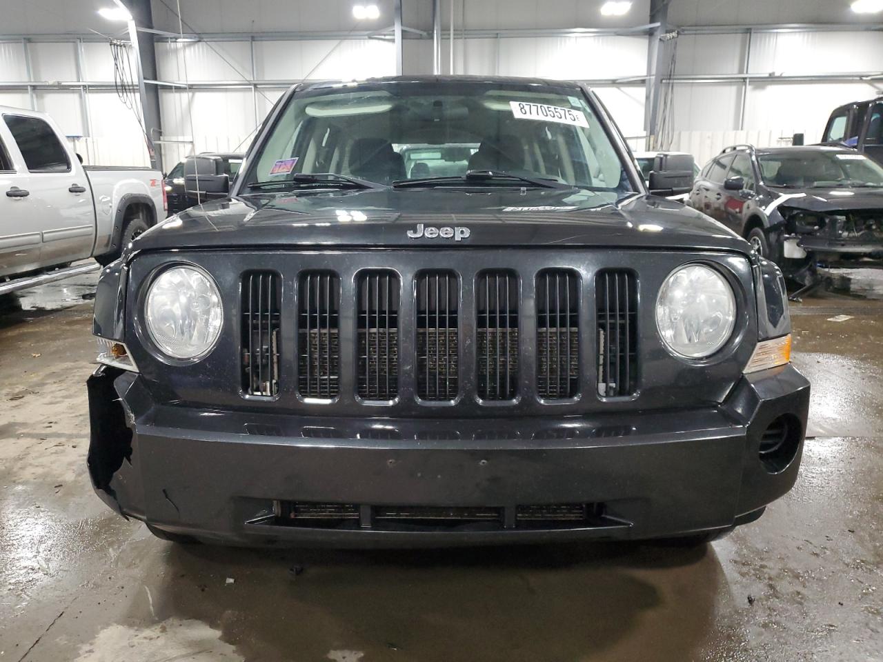 2010 Jeep Liberty (Patriot) VIN 1J4NT2GB7AD503156 Copart auction photo, front end / rear end damage thumbnail 5