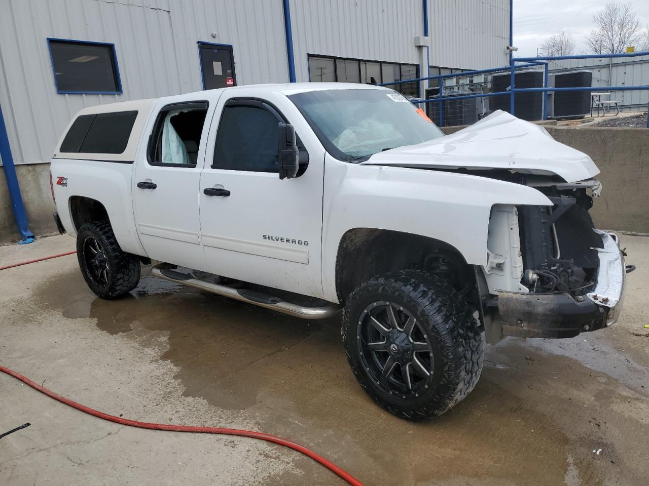 2012 Chevrolet Silverado VIN 3GCPKSE75CG187522 Copart auction photo, front end / side damage thumbnail 4