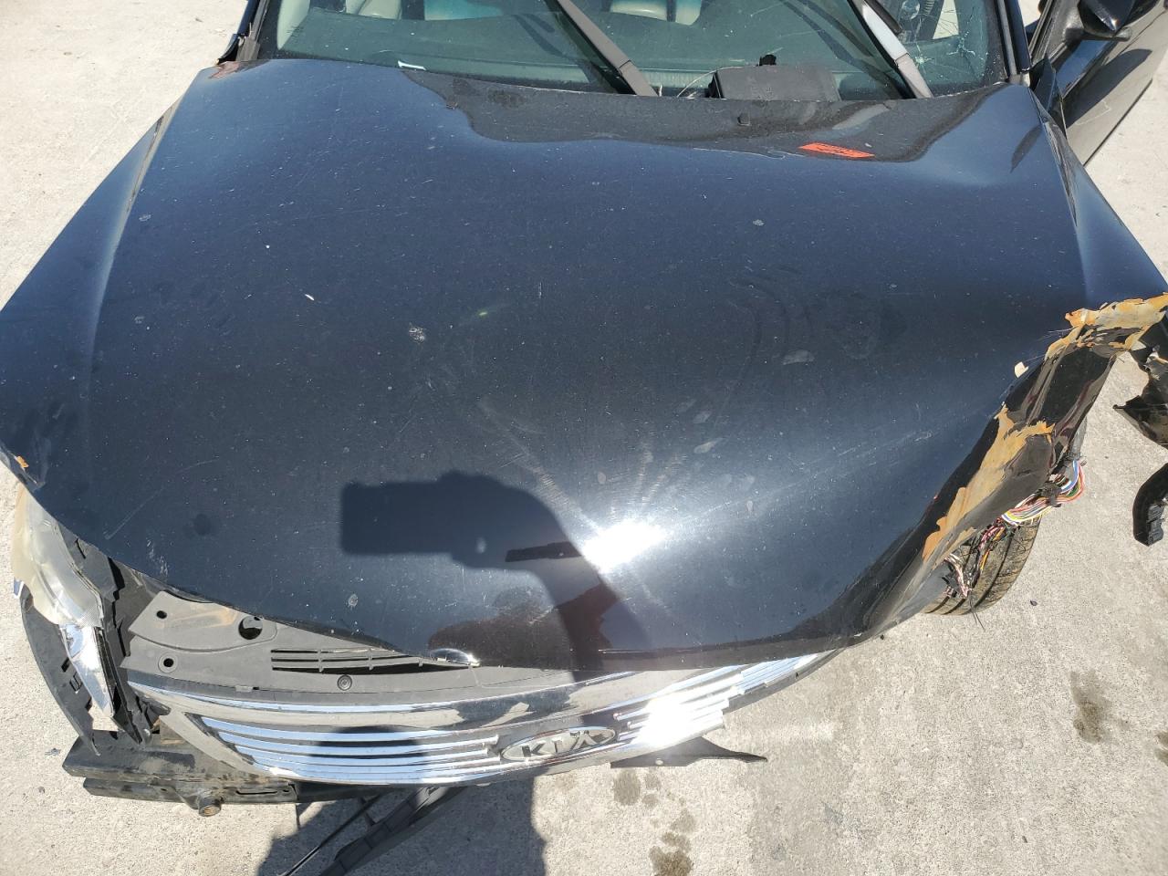 2009 KIA Optima VIN KNAGE228095332998 Copart auction photo, front end / side damage thumbnail 12