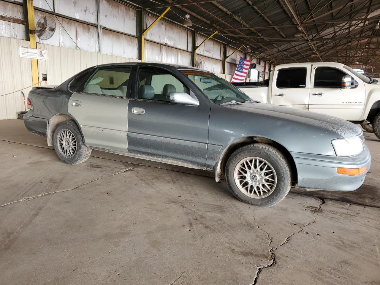 1997 Toyota Avalon VIN 4T1BF12B4VU207093 Copart auction photo, rear end damage thumbnail 4