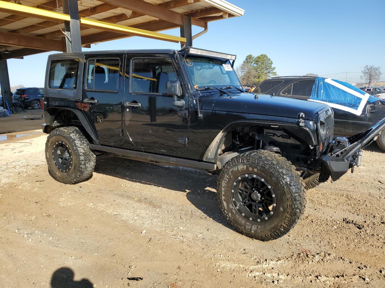 2011 Jeep Wrangler VIN 1J4BA6H15BL504416 Copart auction photo, burn damage thumbnail 4