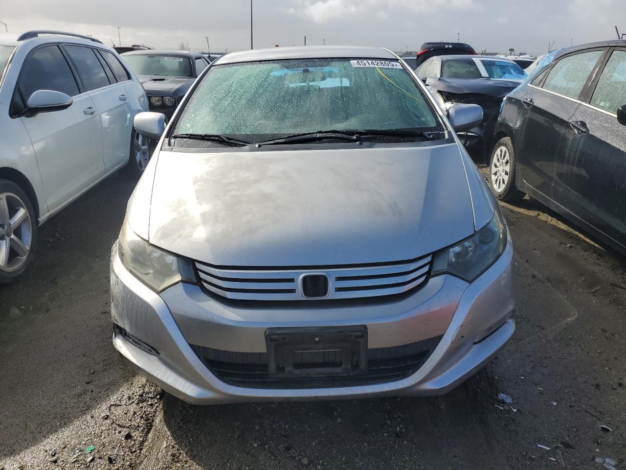 2010 Honda Insight VIN JHMZE2H58AS039976 Copart auction photo, all over damage thumbnail 5