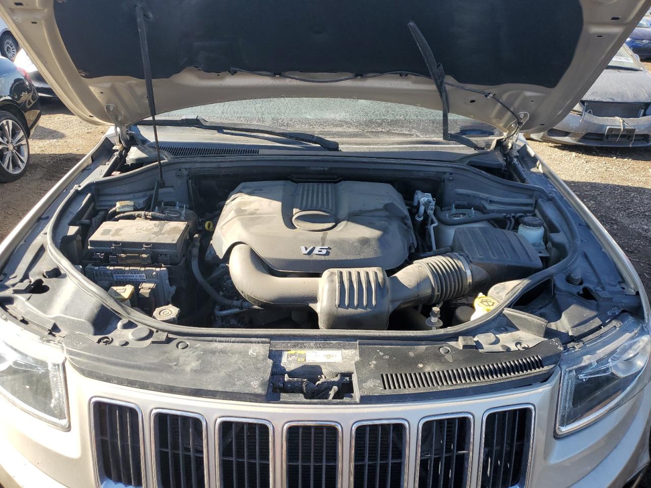 2014 Jeep Grand Cherokee VIN 1C4RJFBG9EC413493 Copart auction photo, side damage thumbnail 11