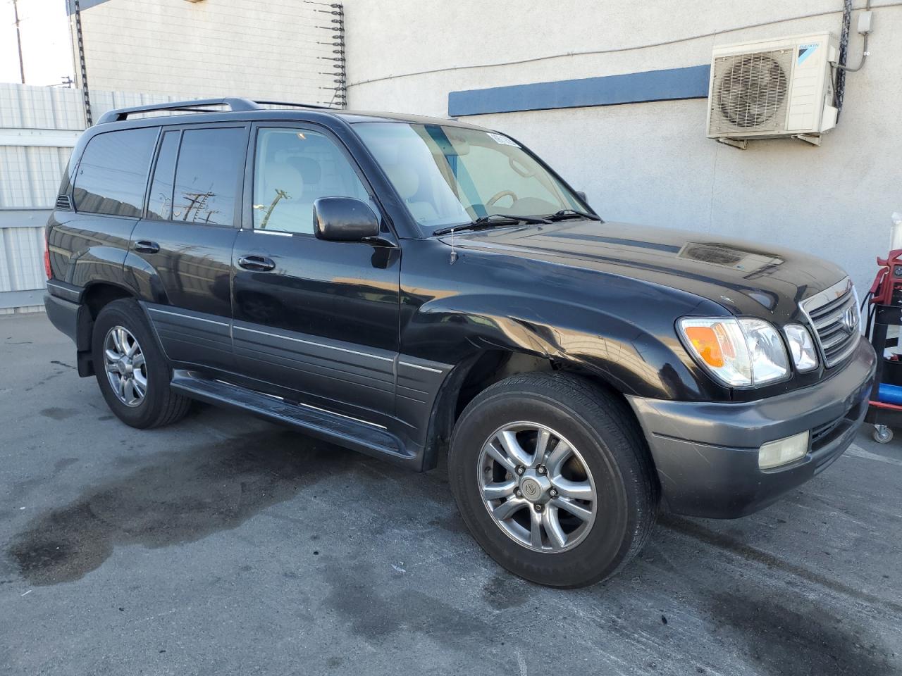 2004 Lexus LX VIN JTJHT00W343541138 Copart auction photo, front end damage thumbnail 4