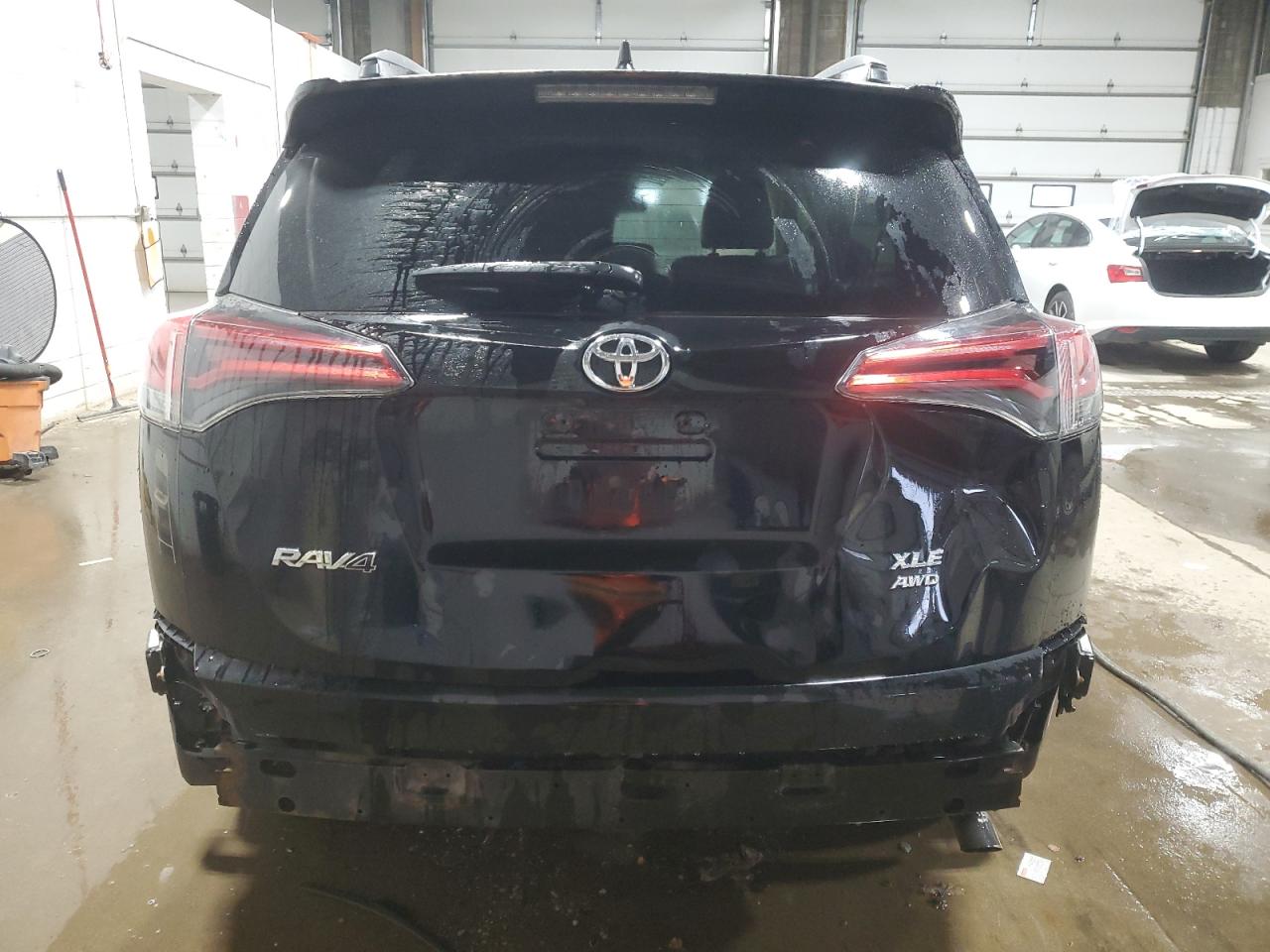 2018 Toyota RAV 4 VIN 2T3RFREV4JW839032 Copart auction photo, rear end damage thumbnail 6