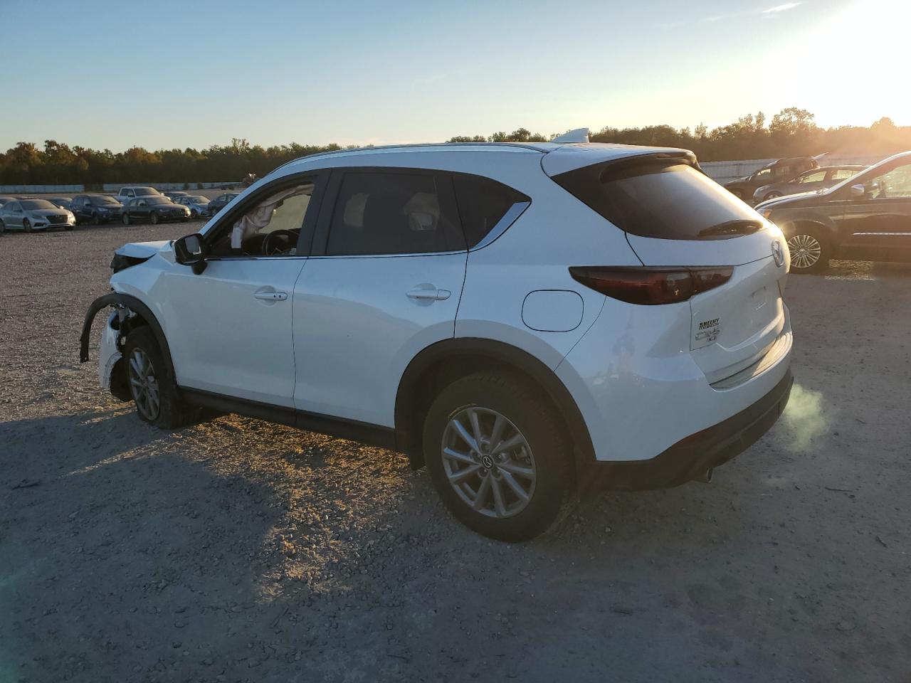 2022 Mazda CX-5 VIN JM3KFBCM2N0596681 Copart auction photo, front end / minor dent/scratches damage thumbnail 2