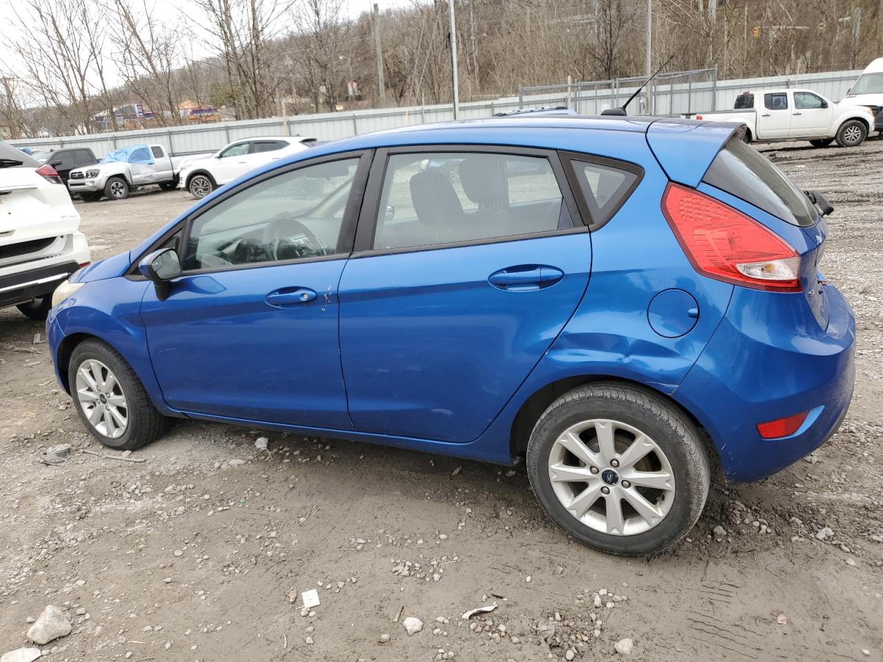 2011 Ford Fiesta VIN 3FADP4EJ1BM103746 Copart auction photo, side damage thumbnail 2