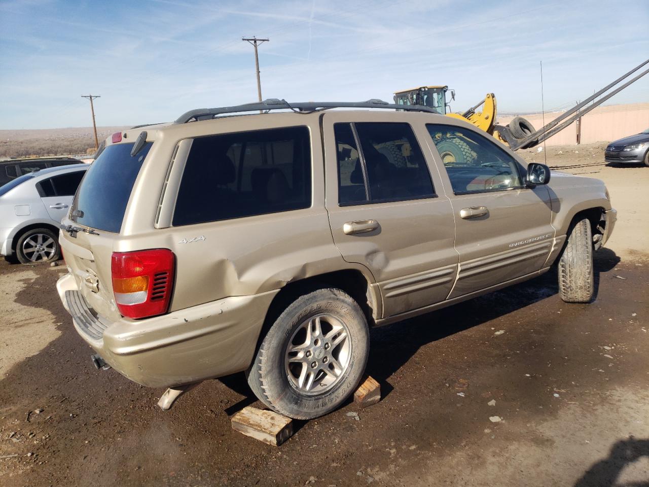 1999 Jeep Grand Cherokee VIN 1J4GW68N0XC807850 Copart auction photo, side / rear end damage thumbnail 3
