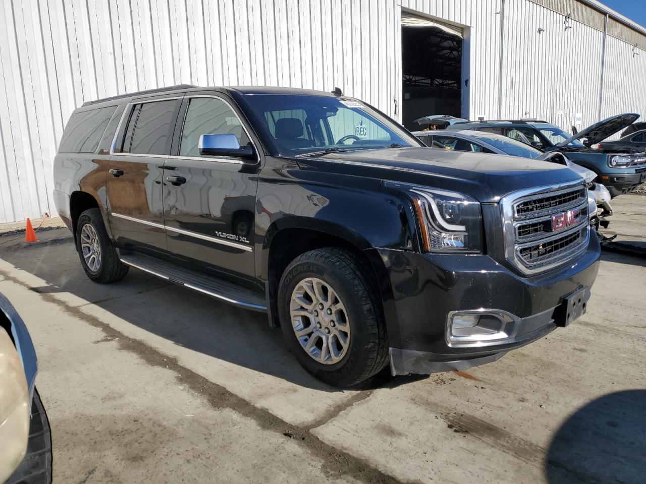 2015 GMC Yukon VIN 1GKS2HKC8FR116287 Copart auction photo, front end / minor dent/scratches damage thumbnail 4