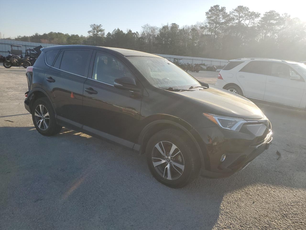 2018 Toyota RAV 4 VIN 2T3RFREV3JW815790 Copart auction photo, rear end damage thumbnail 4