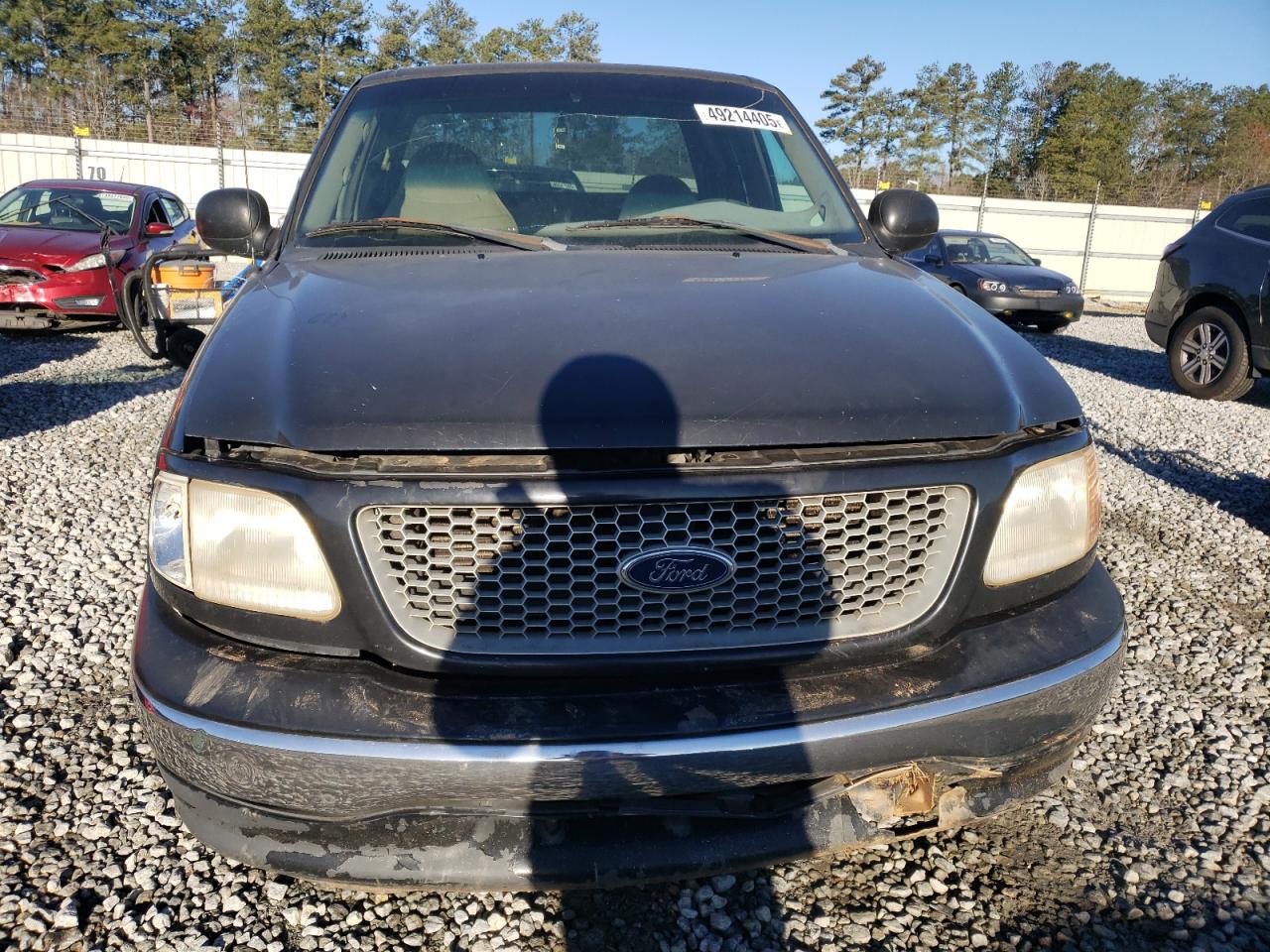 1999 Ford F-150 VIN 1FTRX17L9XNA53124 Copart auction photo, front end / undercarriage damage thumbnail 5
