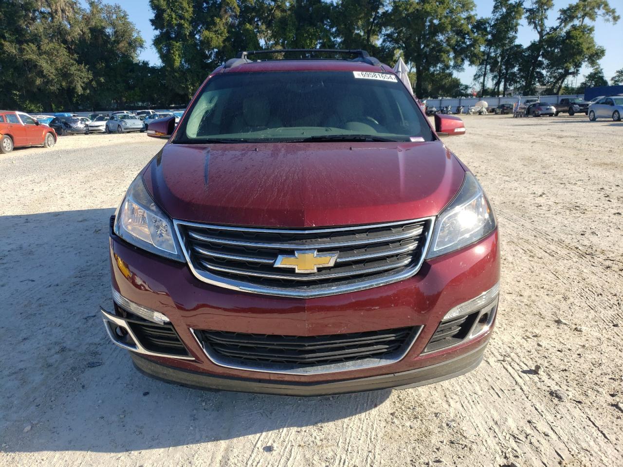 2016 Chevrolet Traverse VIN 1GNKRHKD6GJ335885 Copart auction photo, rear end / minor dent/scratches damage thumbnail 5