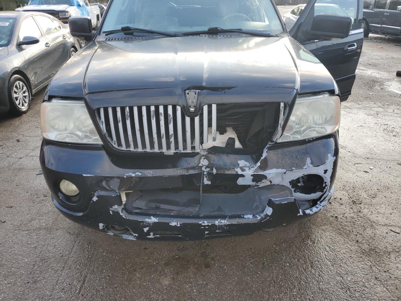 2004 Lincoln Navigator VIN 5LMFU28R24LJ15449 Copart auction photo, front end damage thumbnail 12