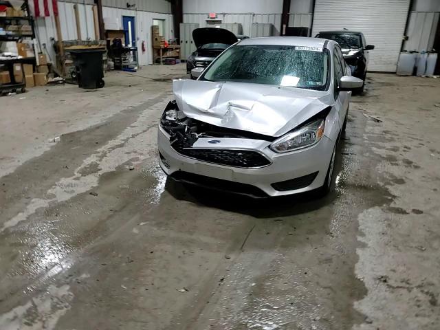 2018 Ford Focus VIN 1FADP3F20JL219666 Copart auction photo, front end damage thumbnail 13