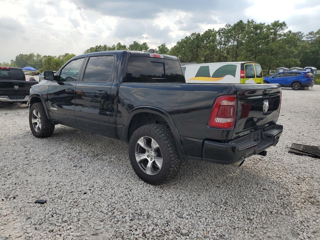 2020 RAM 1500 VIN 1C6SRFJT1LN386713 Copart auction photo, side / front end damage thumbnail 2