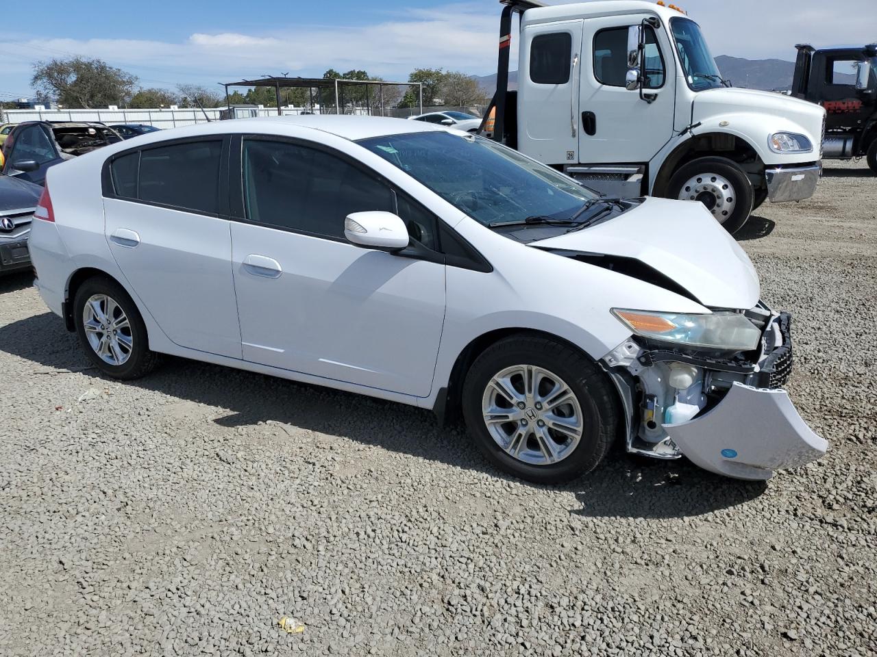 2010 Honda Insight VIN JHMZE2H75AS033599 Copart auction photo, front end damage thumbnail 4