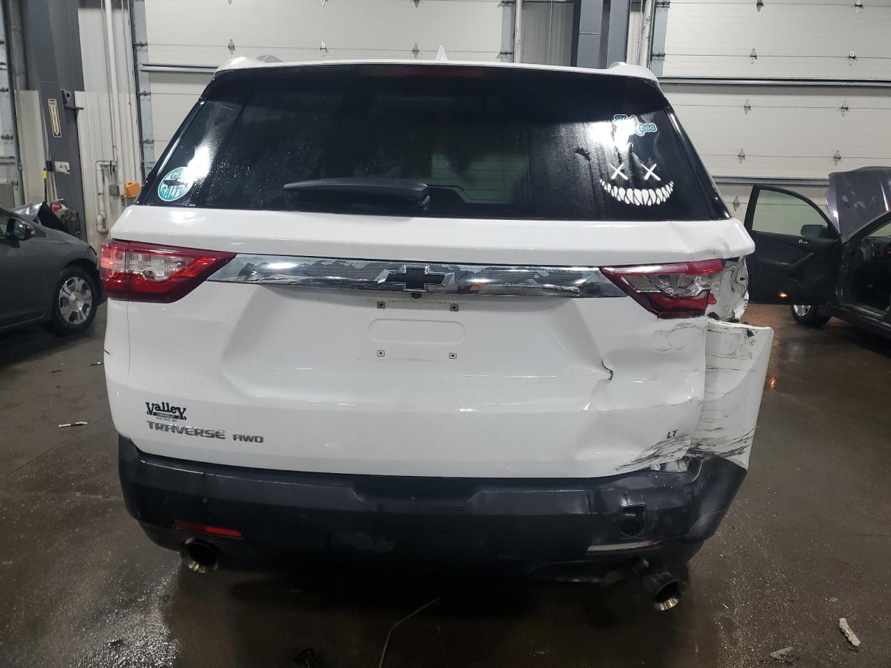 2018 Chevrolet Traverse VIN 1GNEVGKW0JJ188927 Copart auction photo, rear end damage thumbnail 6