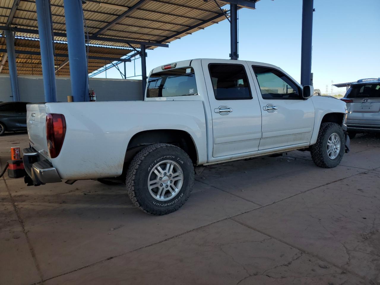 2012 GMC Canyon VIN 1GTH6MFE5C8126517 Copart auction photo, front end damage thumbnail 3