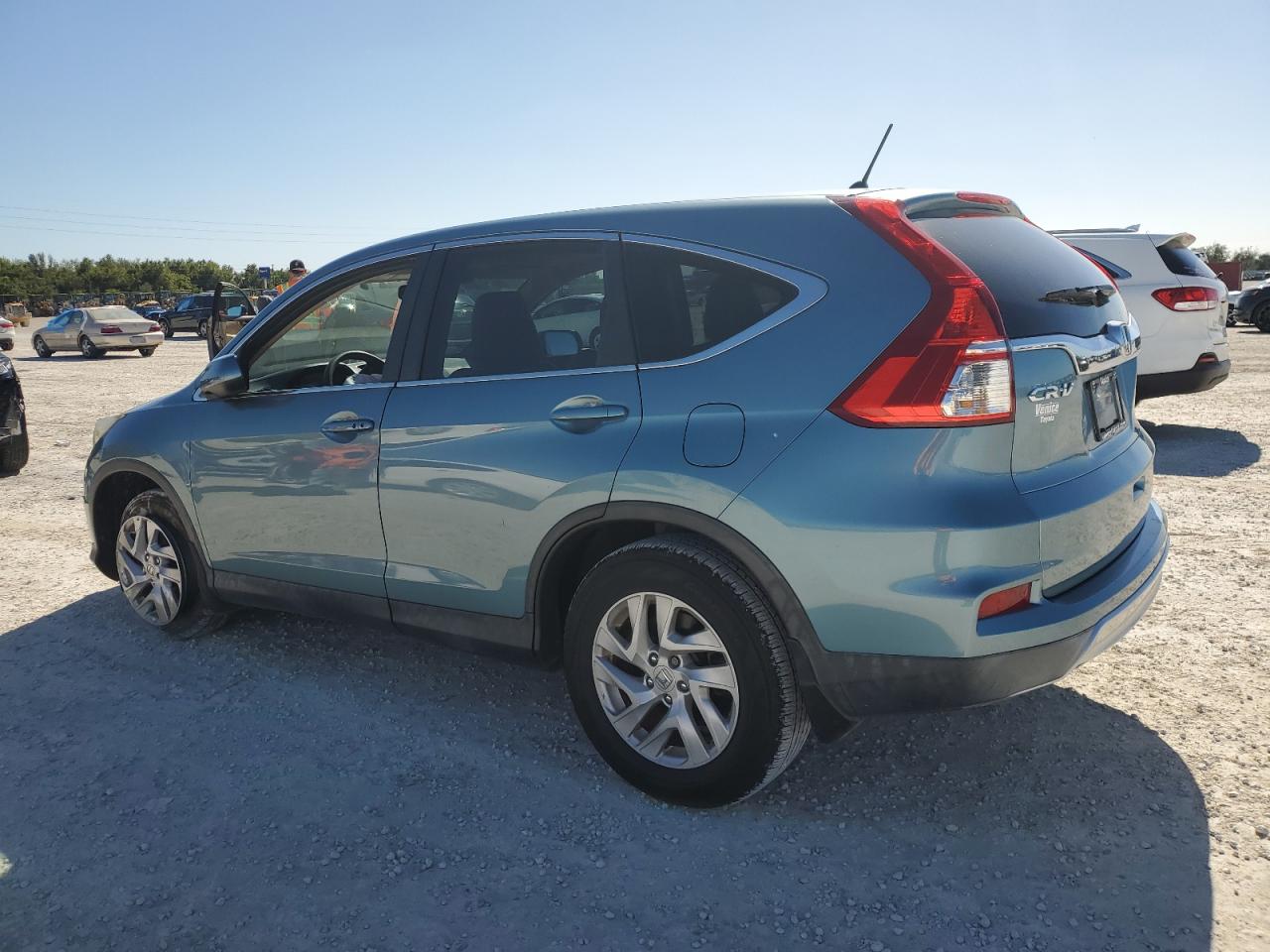 2015 Honda CR-V VIN 2HKRM3H57FH534931 Copart auction photo, side / front end damage thumbnail 2