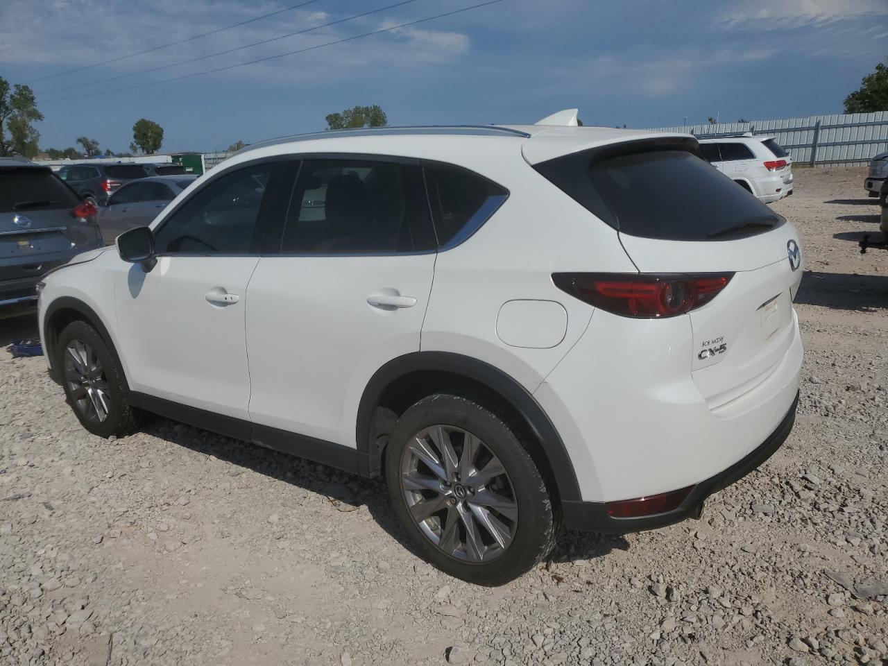 2020 Mazda CX-5 VIN JM3KFADM1L0776692 Copart auction photo, hail / minor dent/scratches damage thumbnail 2