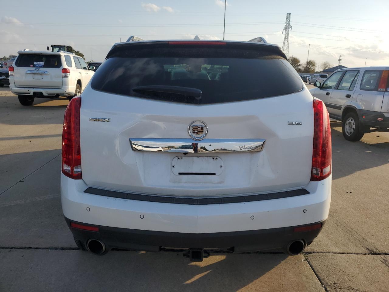 2012 Cadillac SRX VIN 3GYFNCE35CS628157 Copart auction photo, front end / minor dent/scratches damage thumbnail 6