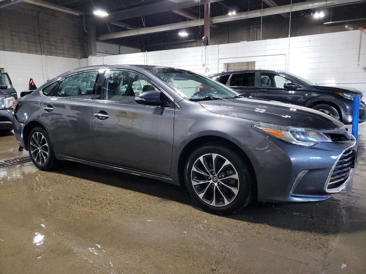 2016 Toyota Avalon VIN 4T1BK1EB0GU209935 Copart auction photo, undercarriage / rear end damage thumbnail 4