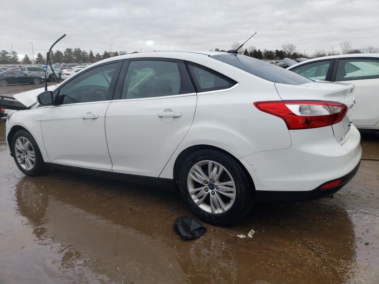 2012 Ford Focus VIN 1FAHP3H23CL339494 Copart auction photo, front end damage thumbnail 2