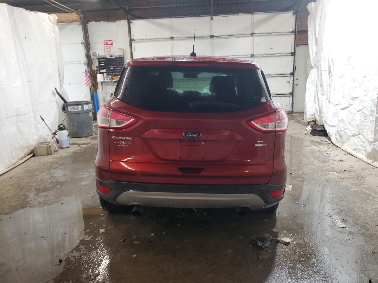 2015 Ford Escape VIN 1FMCU9GXXFUC54630 Copart auction photo, side / rear end damage thumbnail 6