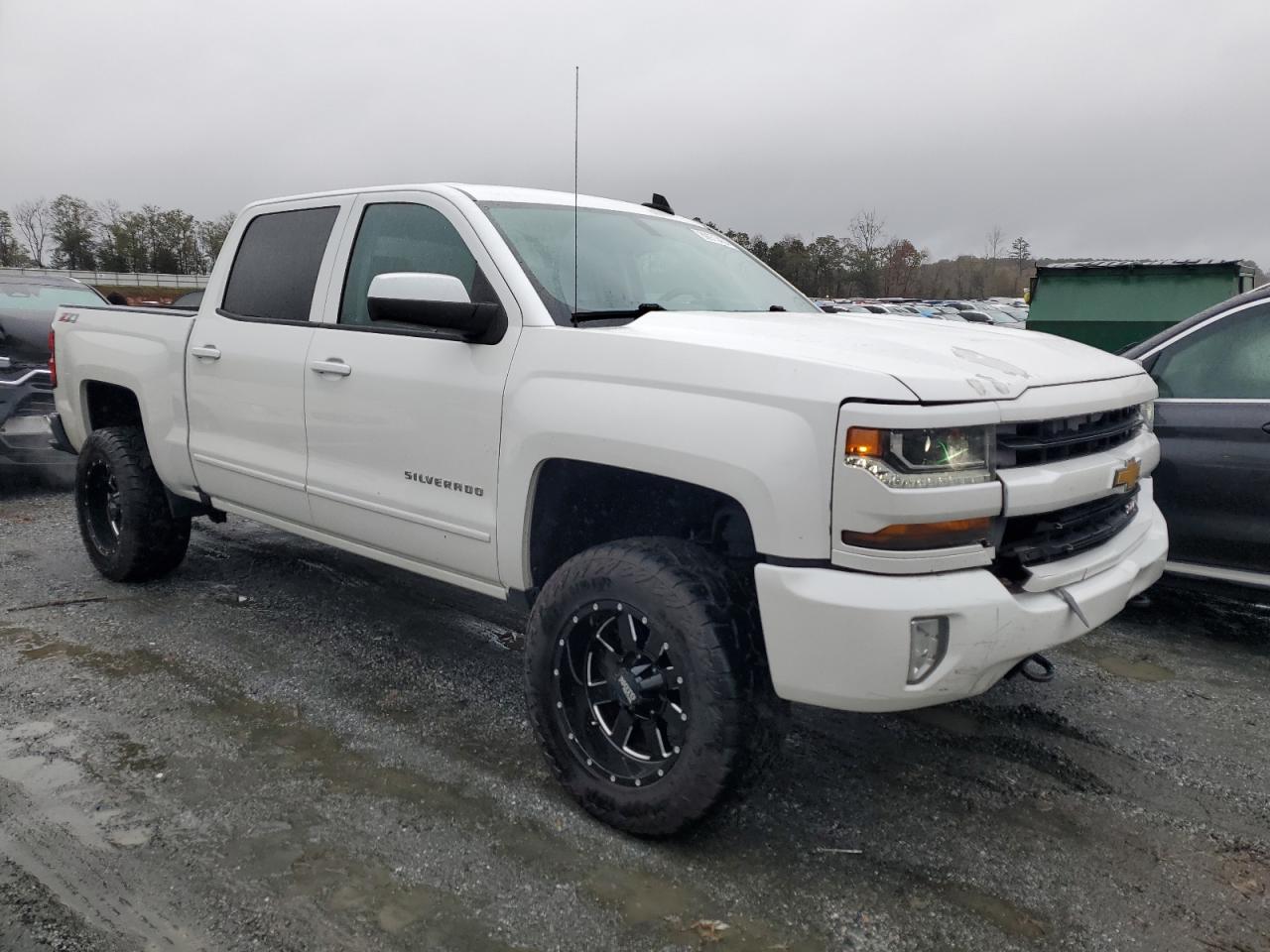 2016 Chevrolet Silverado VIN 3GCUKREC4GG368884 Copart auction photo, front end / rear end damage thumbnail 4