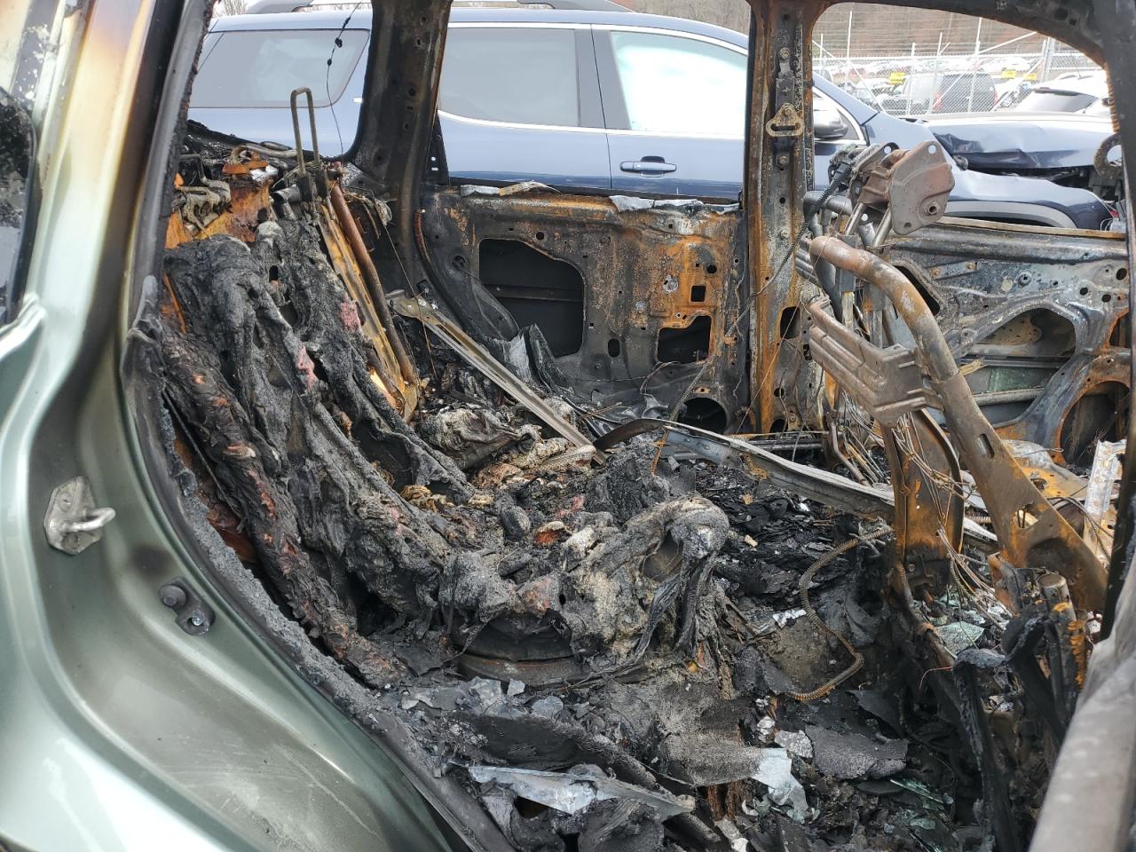 2015 Subaru Forester VIN JF2SJADCXFH810943 Copart auction photo, burn damage thumbnail 10